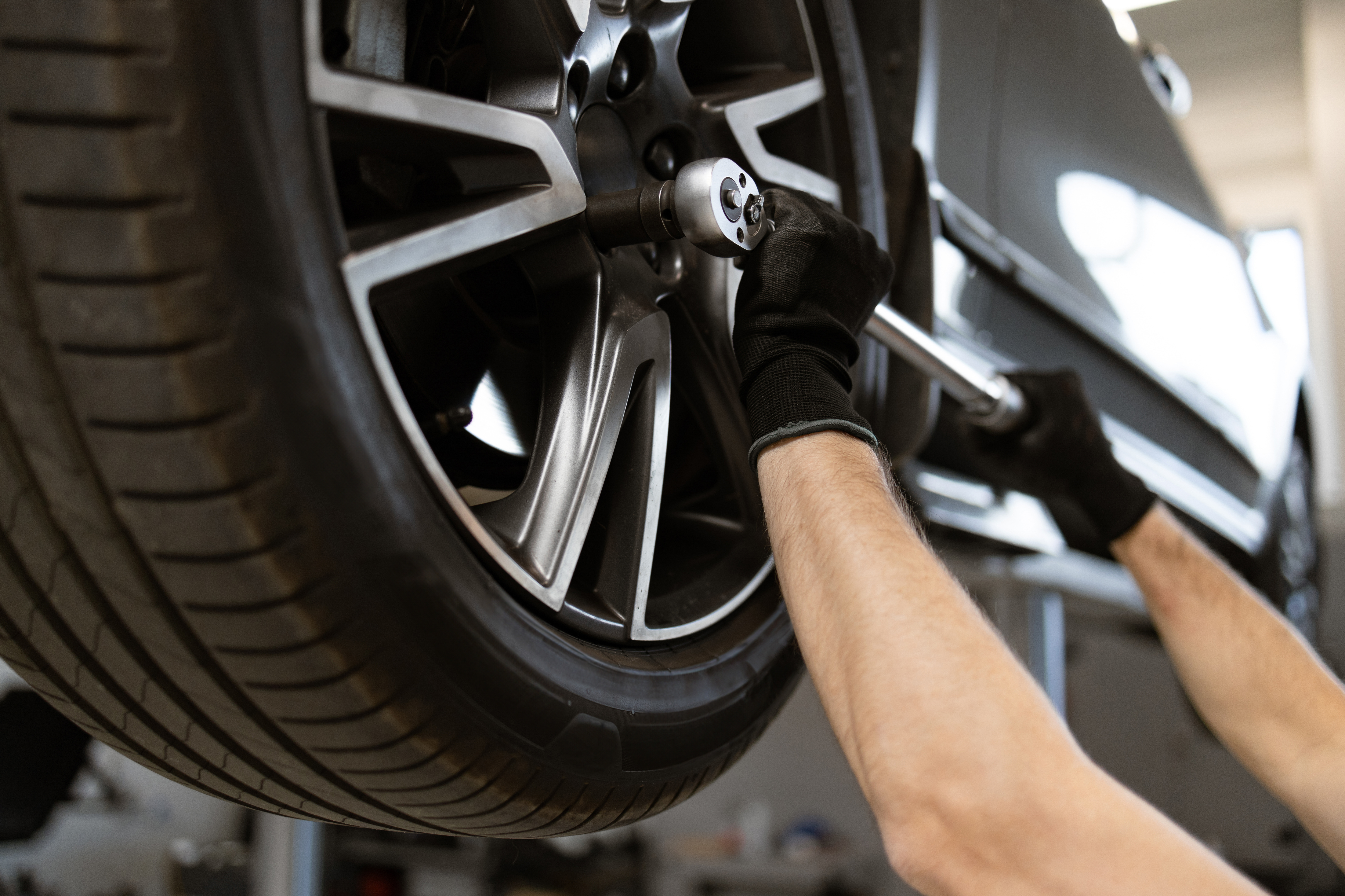 Mechanic working on suspension components