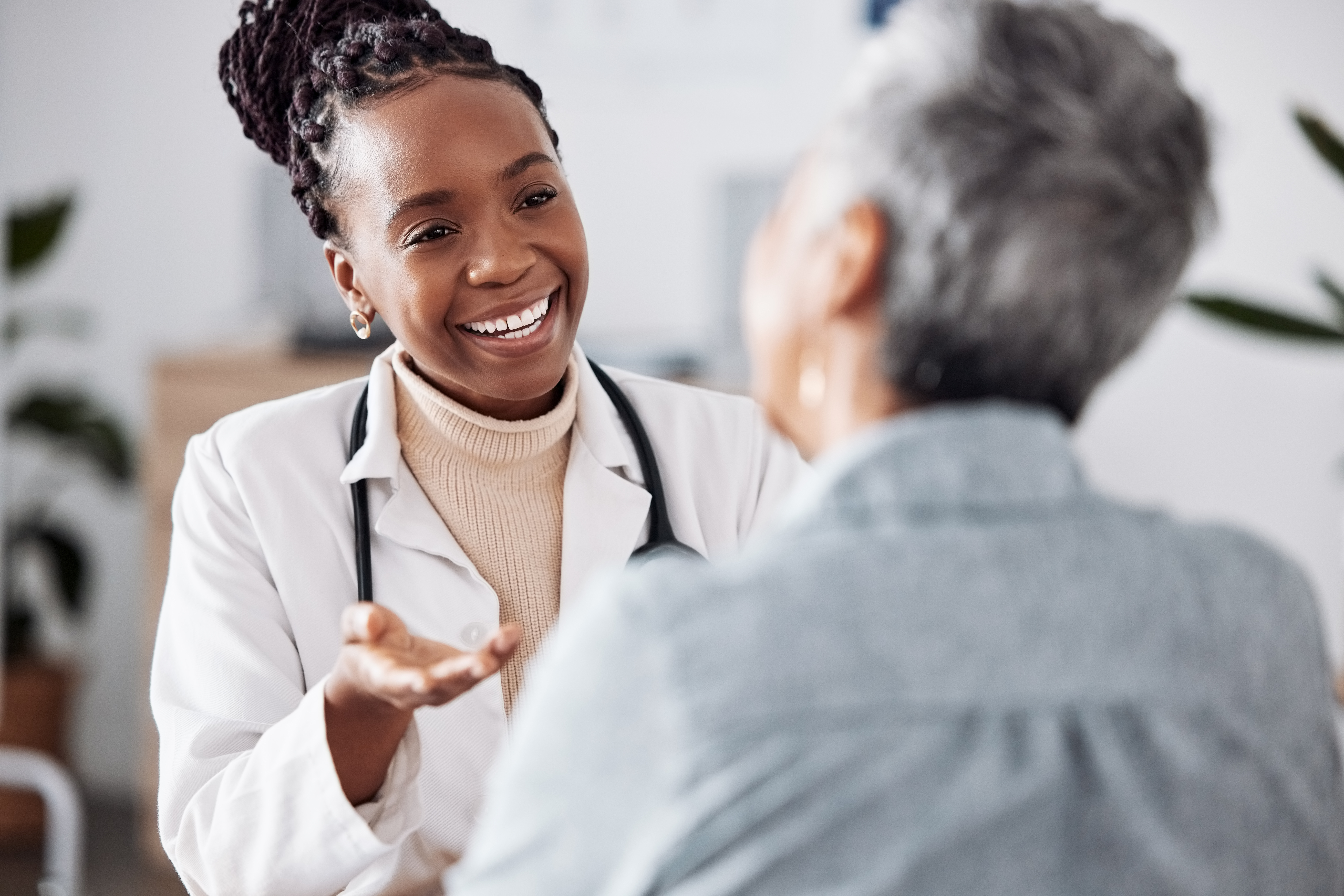 Doctor consulting with patient in a modern healthcare setting