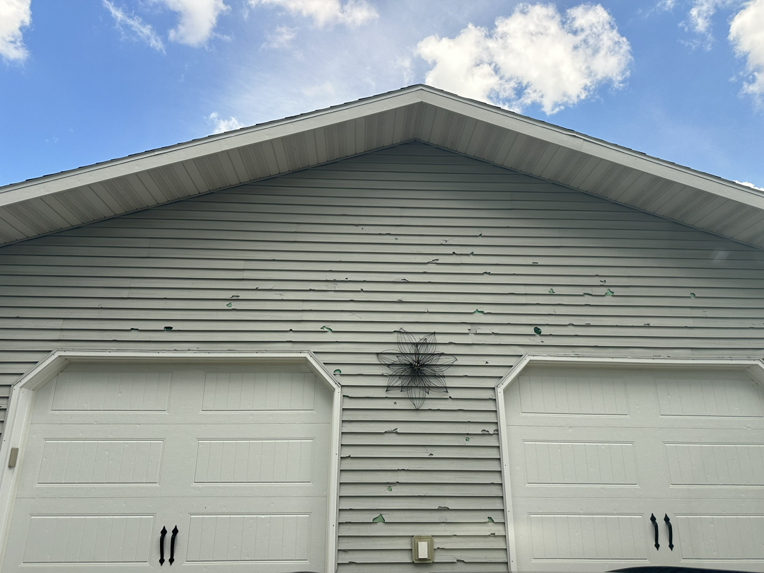Hail damage on residential siding