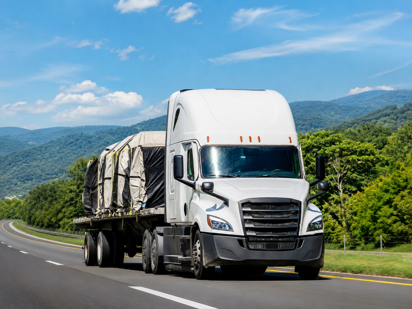 Commercial freight truck on highway representing Riteway Solutions asset-based carrier services