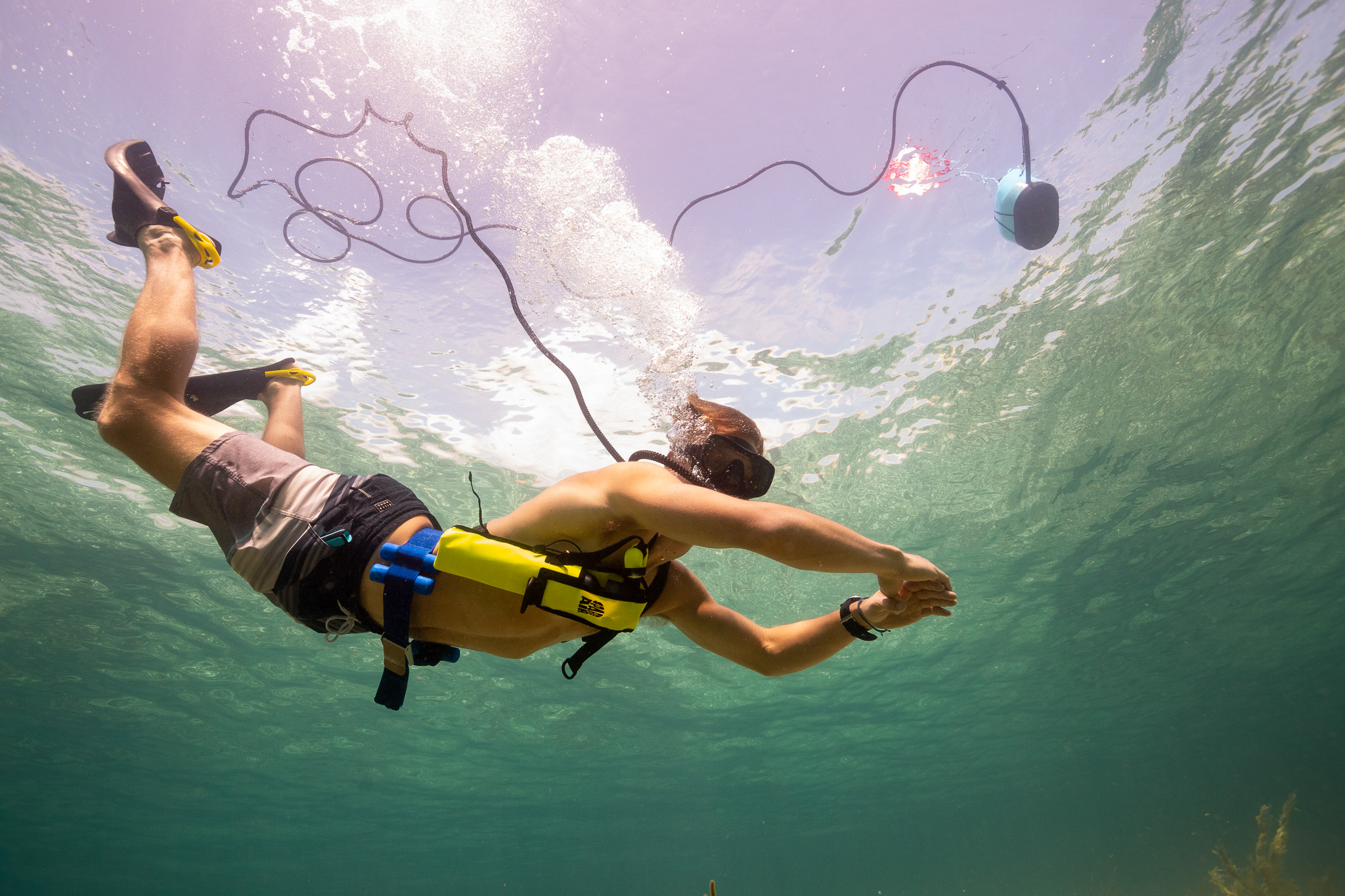Scuba diver in professional diving suit underwater
