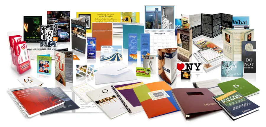 A collection of various printed materials and stationery items.