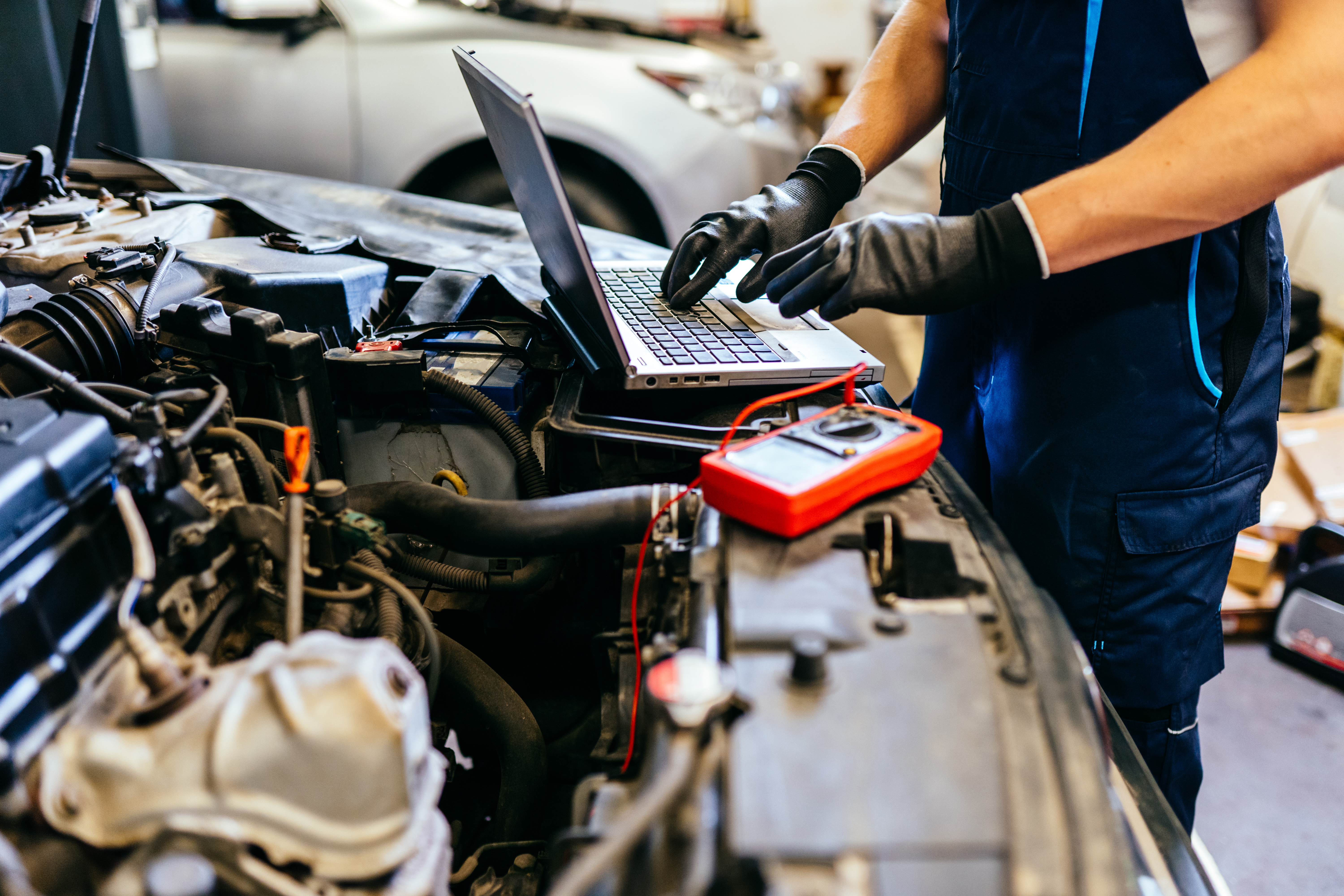Modern engine diagnostic equipment in use
